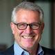 Professional headshot of Mark T., a satisfied male client in his early 50s.