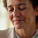 Person practicing mindful breathing or light meditation, symbolizing stress reduction.